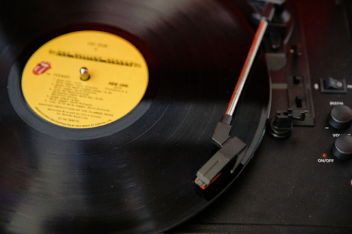 Vinyl record playing on a turntable.