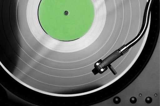 Audio Technica LP60X turntable spinning a vinyl record.