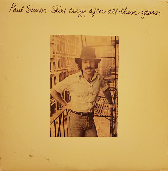 Paul Simon – Still Crazy After All These Years – Release:541bb1d7-3bd2-4fe7-aa29-32a6d71bf44e (cover)