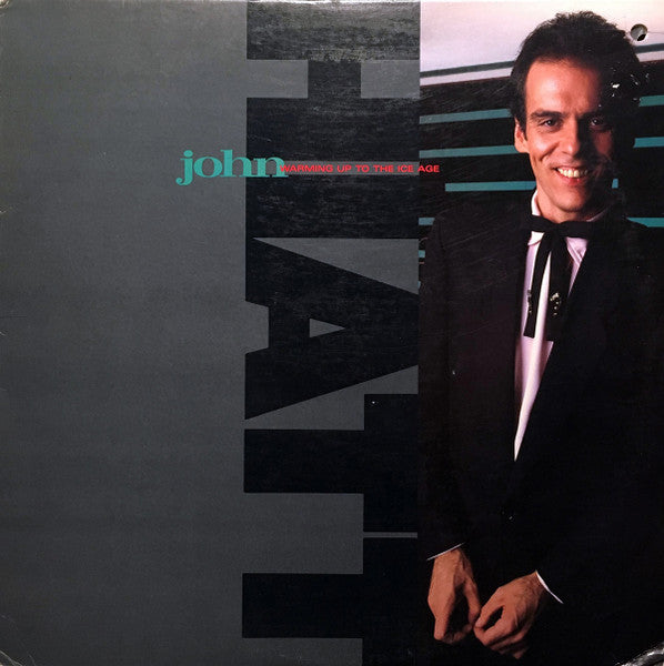John Hiatt – Warming Up To The Ice Age – Release:27101c26-6c23-4d49-af4b-f9d75c4ec874 (cover)