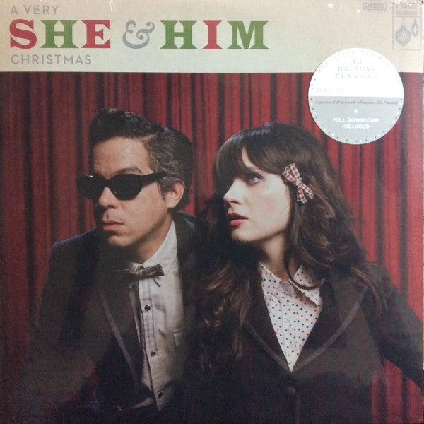 She & Him – A Very She & Him Christmas  – Release:07802794-f41e-4e02-b44a-063026b428ad (cover)